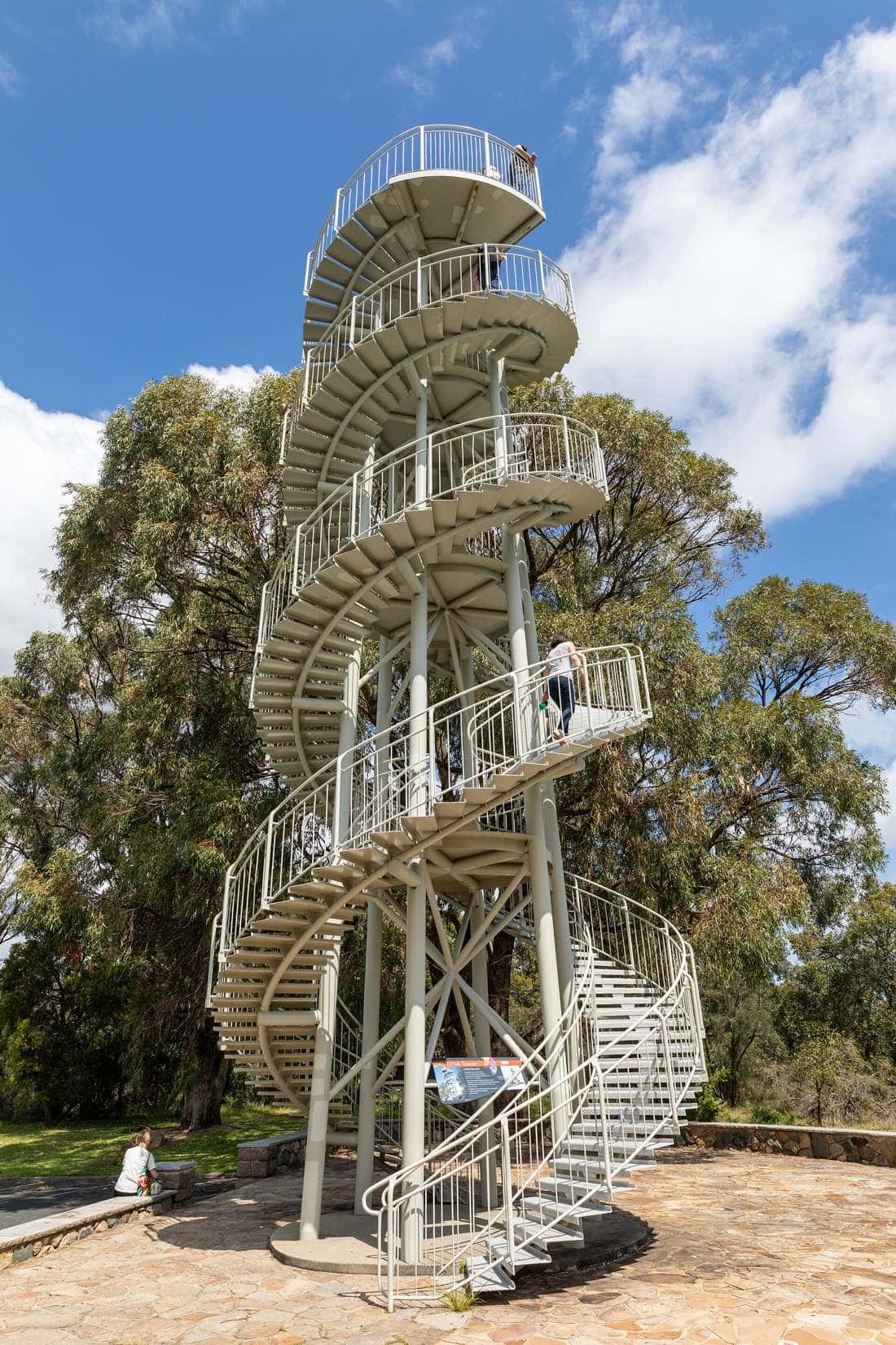 The white double-helix DNA Tower with its spiral staircase rising above bushland in Kings Park